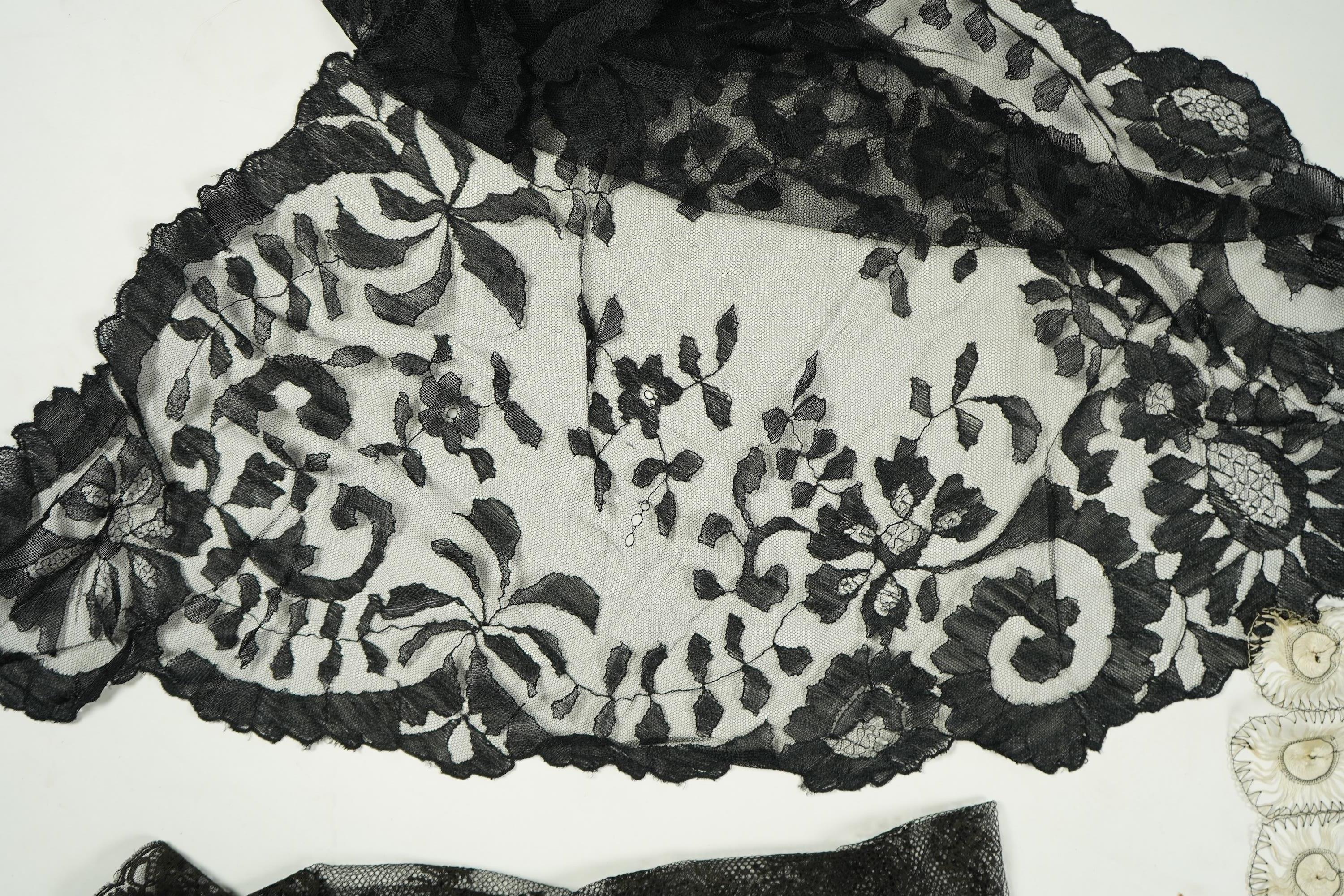 A fine cream and black silk ‘tatting’ stole, two black silk stoles, two bonnet veils and various collars and small triangular mantilla etc. Condition - some damage to bonnet veil., Tatting stole 184cm long.